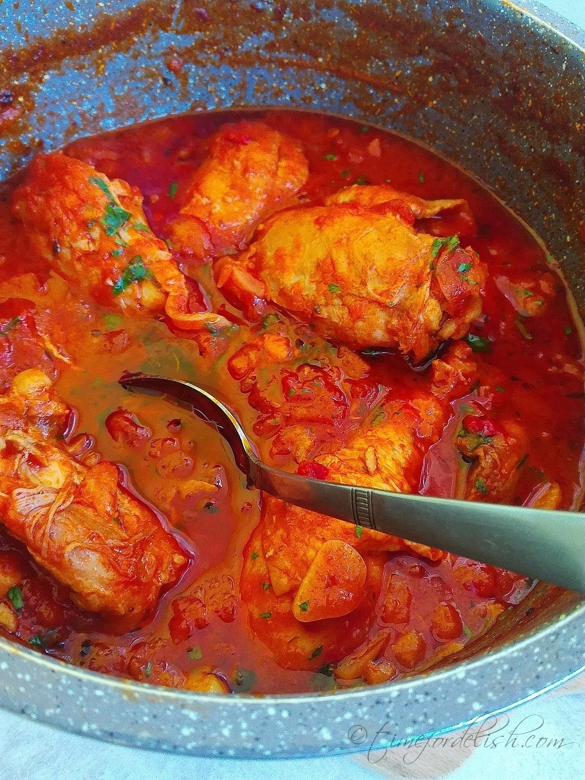 a pan with tomato chicken recipe